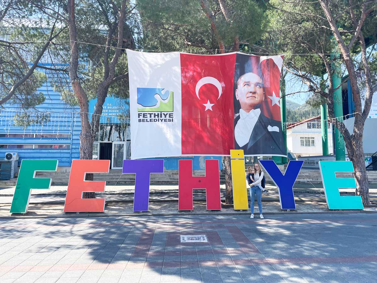 Standing in front of the big Fethiye sign